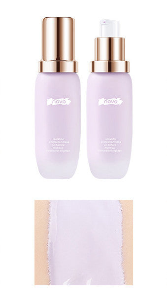 Applying colour-correcting makeup primer with fingertip