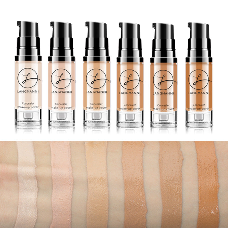 Applying waterproof liquid concealer with makeup brush