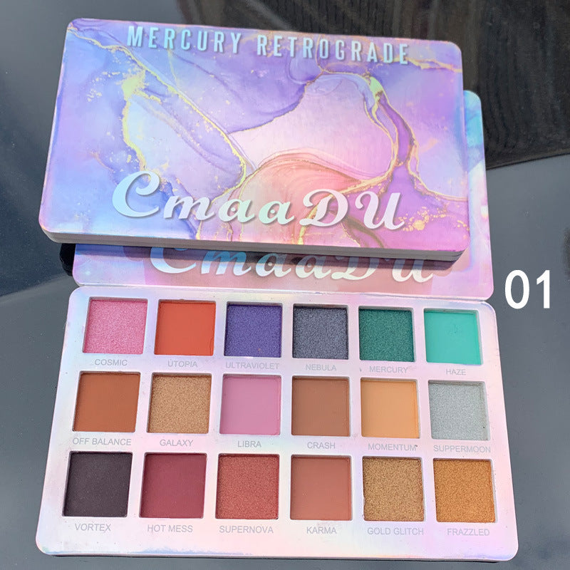 Applying glitter eyeshadow from 18-colour palette