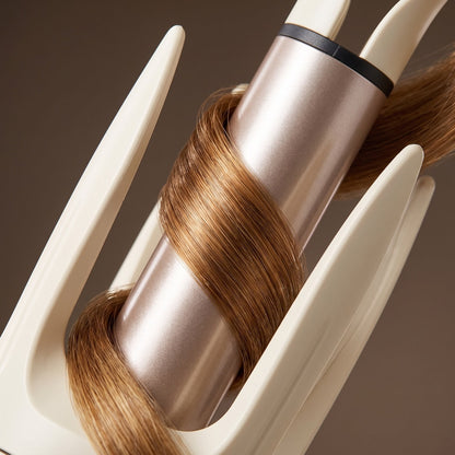 Model with salon-style curls from automatic hair curler