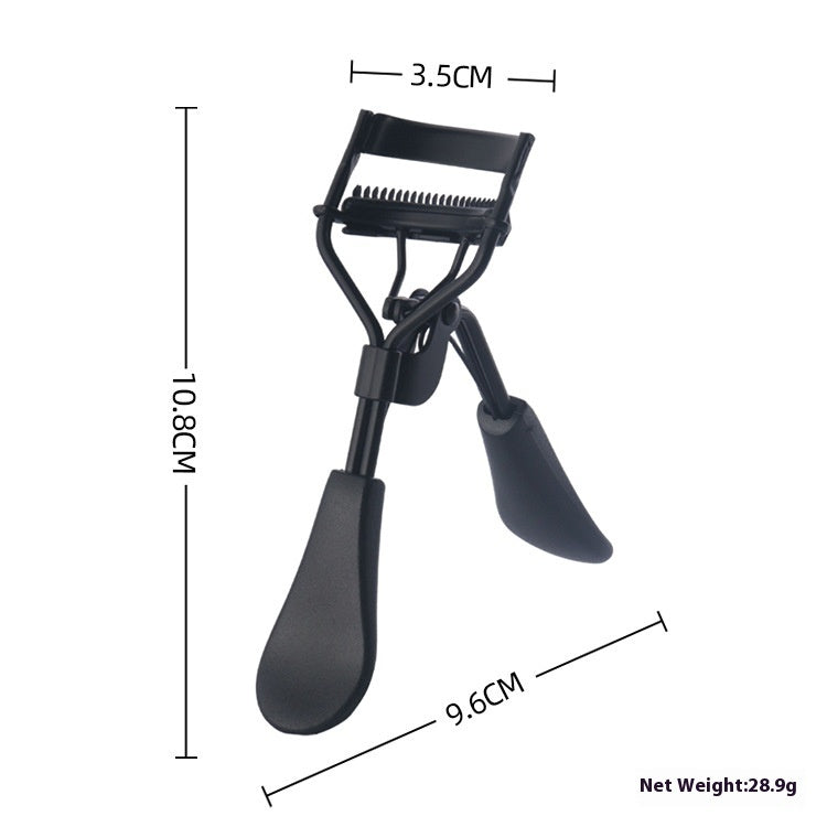 Comb eyelash curler held in hand for size reference